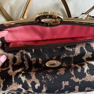 Coach Vintage Cheetah Print leather and fabric satchel with crossbody strap.